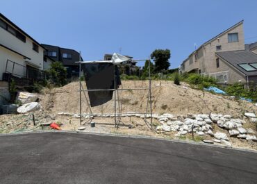当該地①